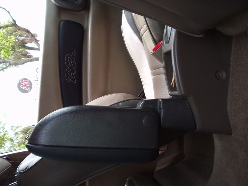 The armrest from the side, closed